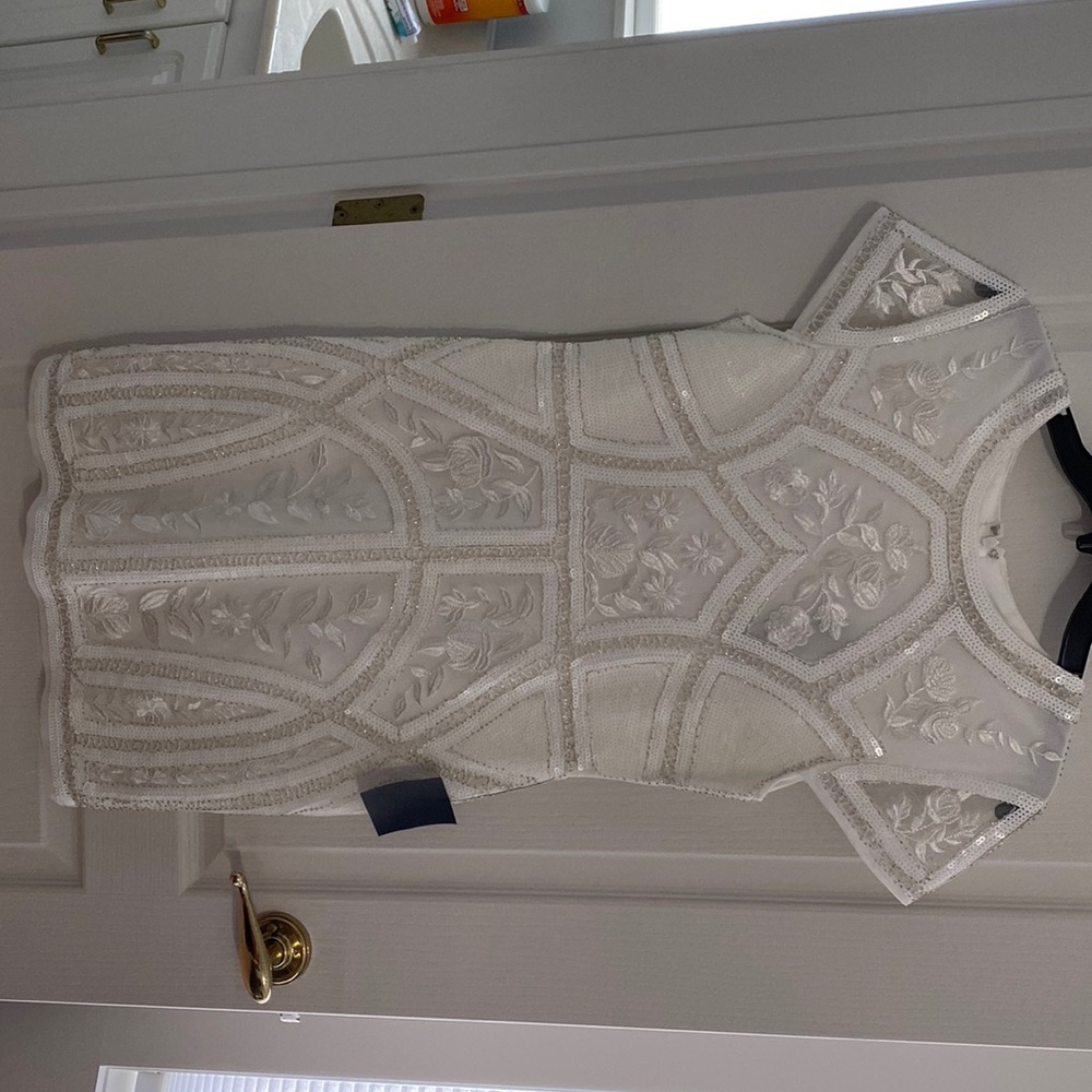 Brand new with tags white sequences dress.